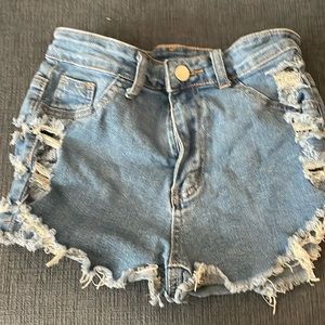 Jean shorts in a size small with slits on the side